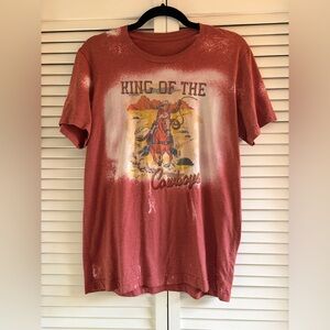 Distressed Vintage-style Red Graphic T-Shirt with Cowboy Print